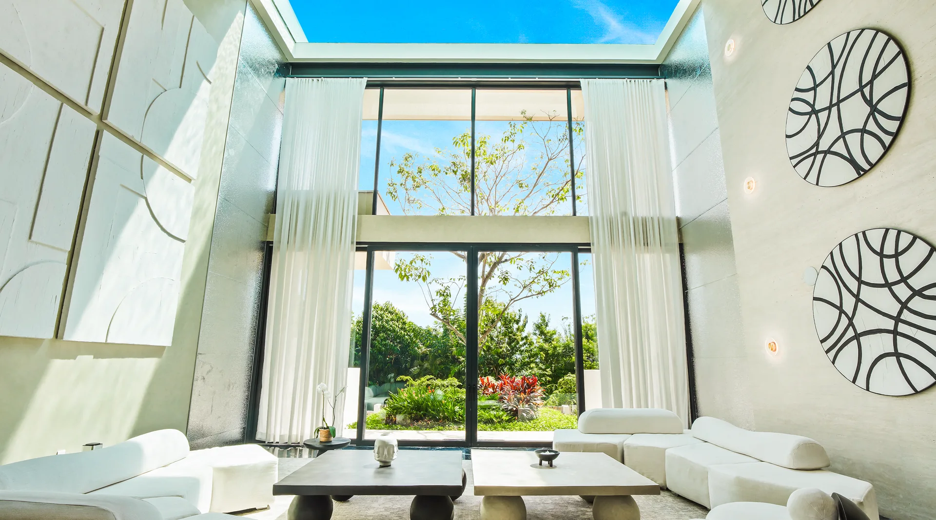 The glass-bottom Sky Pool above the double-height living room